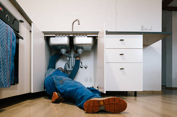 Professional Drain Cleaning technician working in Henryville, IN